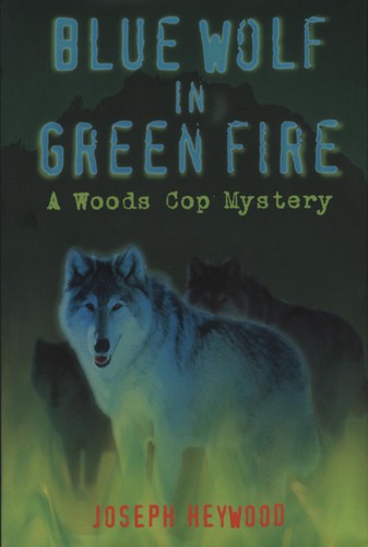 Blue Wolf in Green Fire: A Woods Cop Mystery